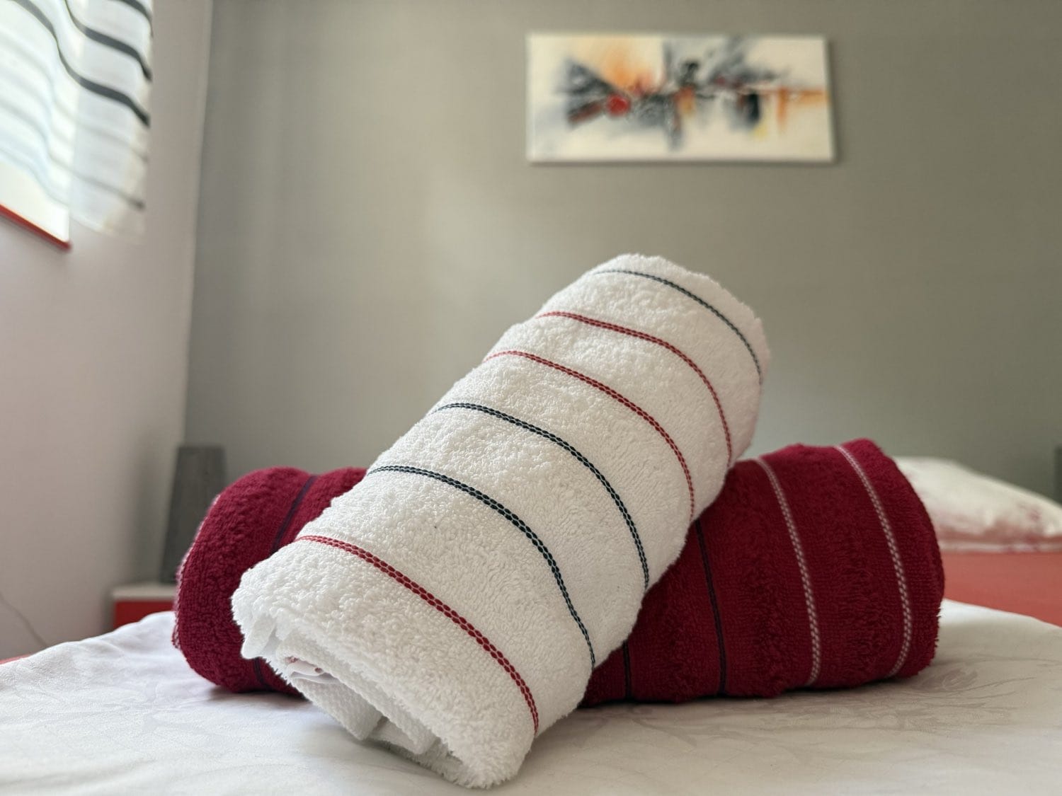 Fresh towels on the bed